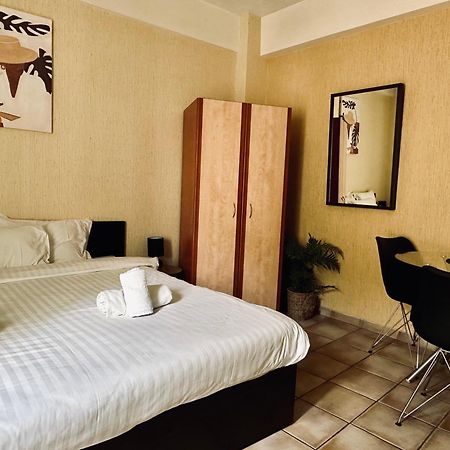Cozy Apartments Mc Queen Афіни Екстер'єр фото